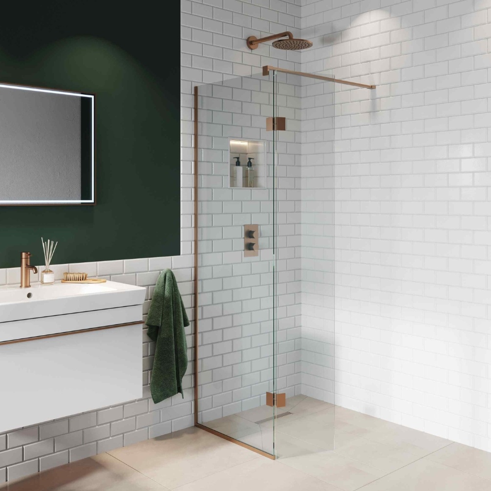 Lifestyle image of the Abacus Brushed Bronze 700mm Wetroom Screen with Wall Support Bar & Deflector Panel